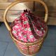 Rattan-work basket with vintage fabric