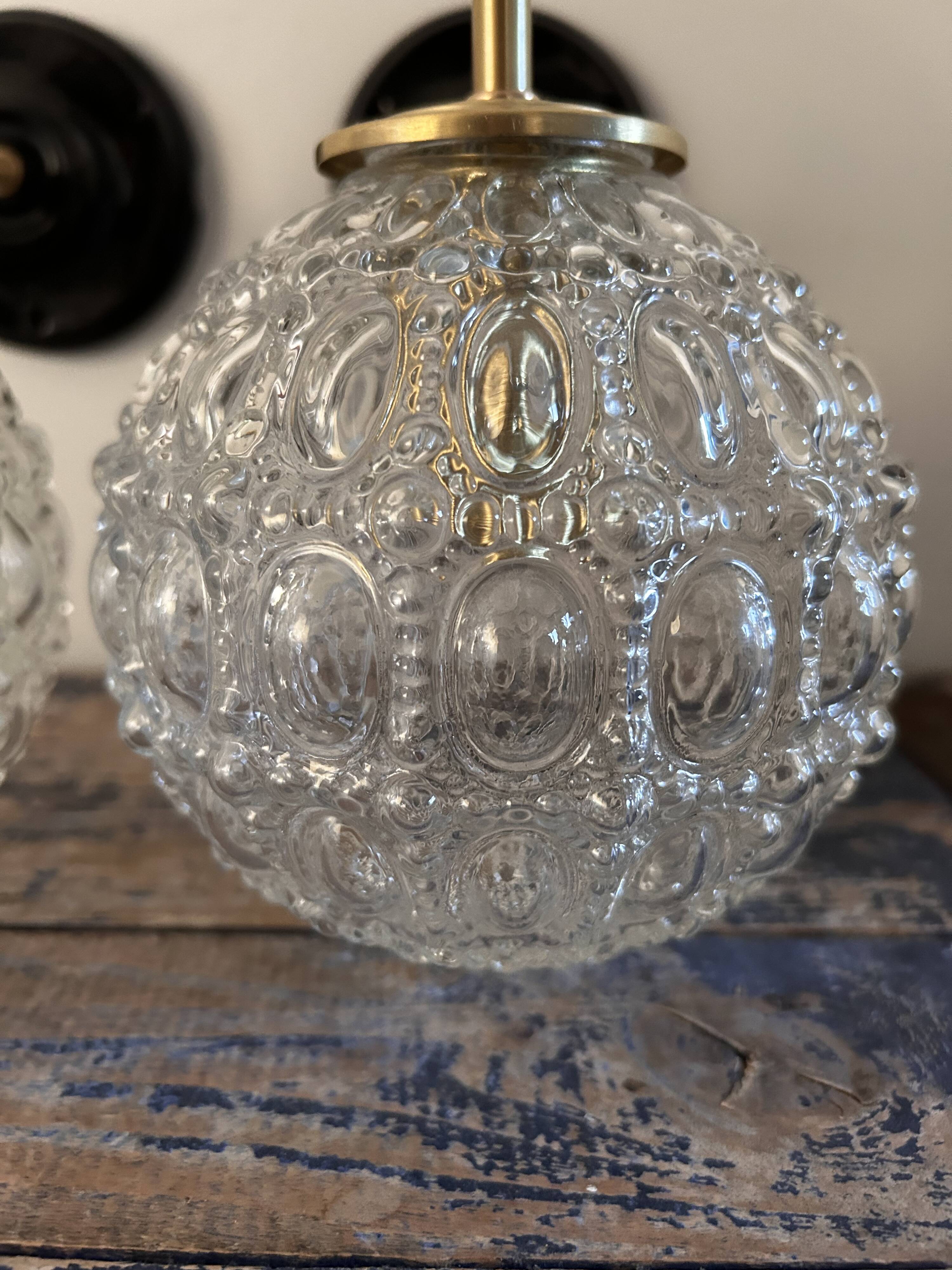 Pair of globe wall lights