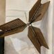 Wicker, iron, and brass magazine rack