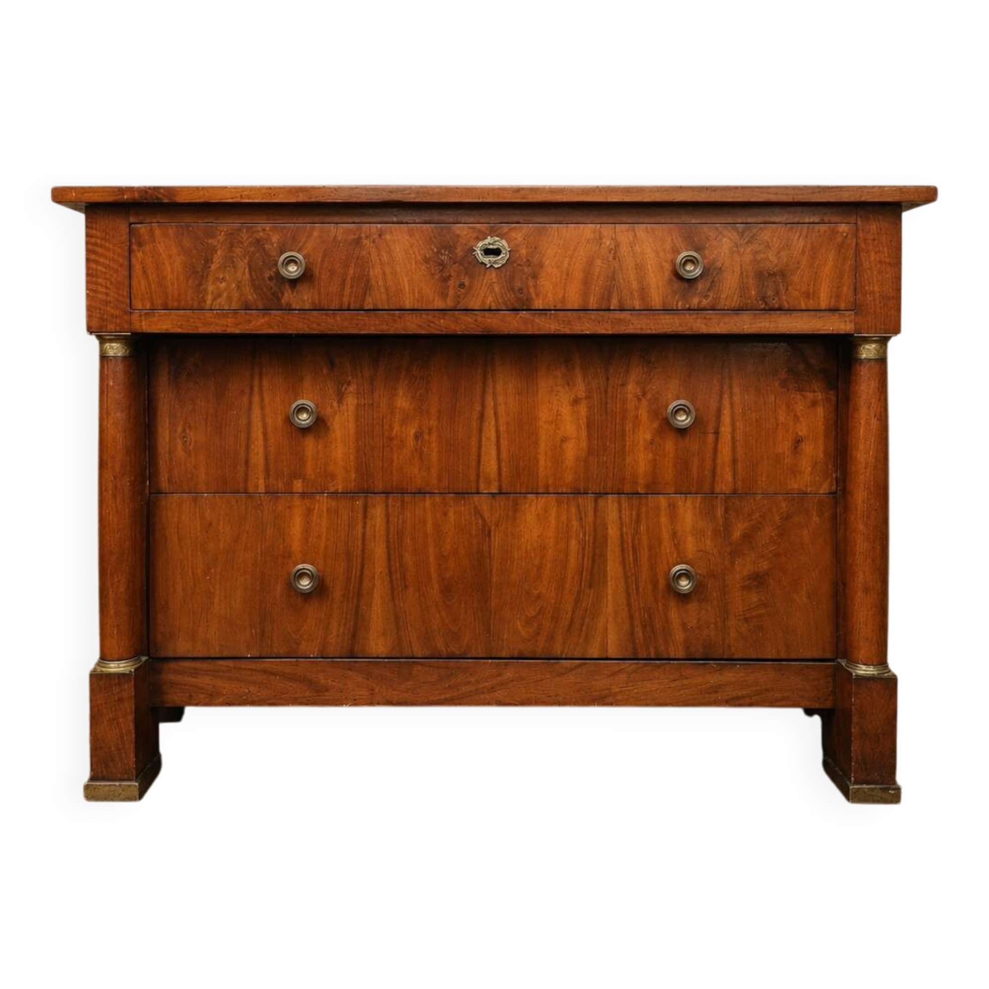 Commode d'époque Empire en noyer à colonnes détachées et bronzes dorés