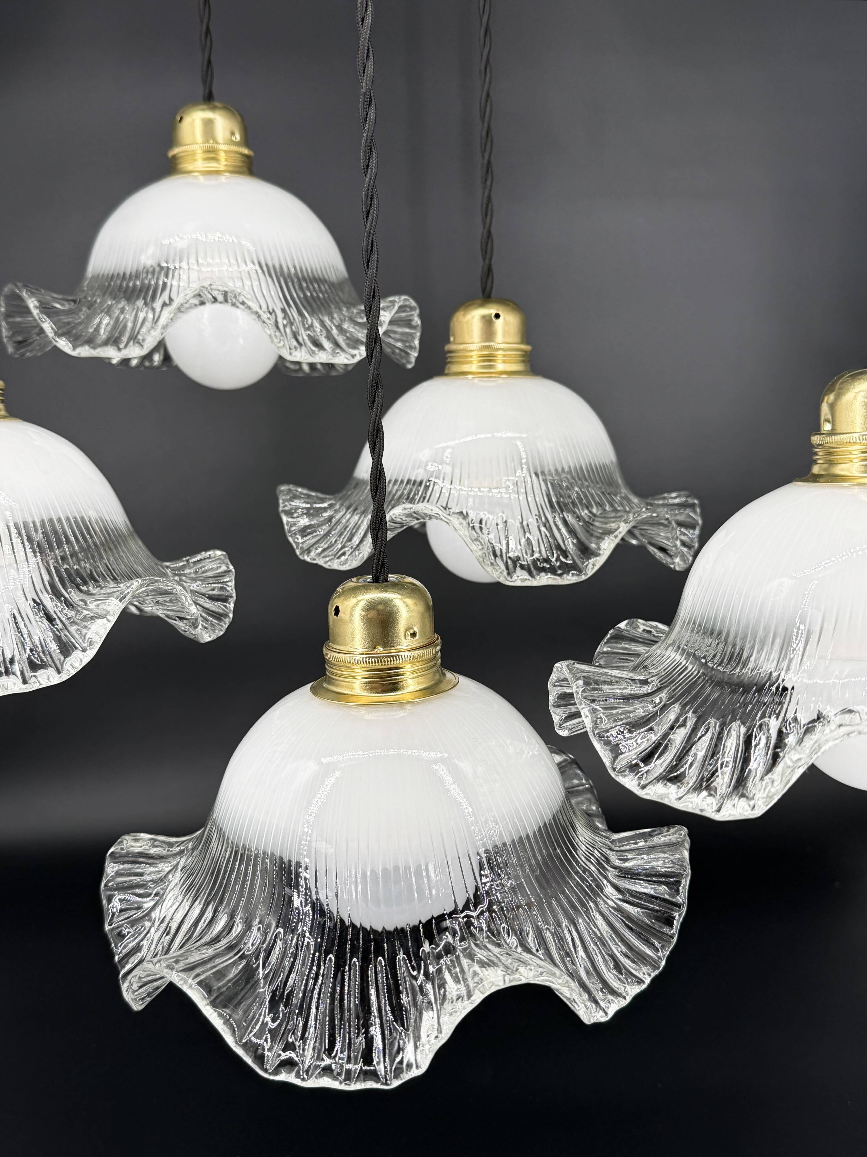 Set of 5 scalloped white opaline flower pendants, braided black cable.