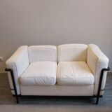 A sofa and two LC2 Cassina armchairs