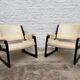 Set of two Baumann sled lounge chairs.