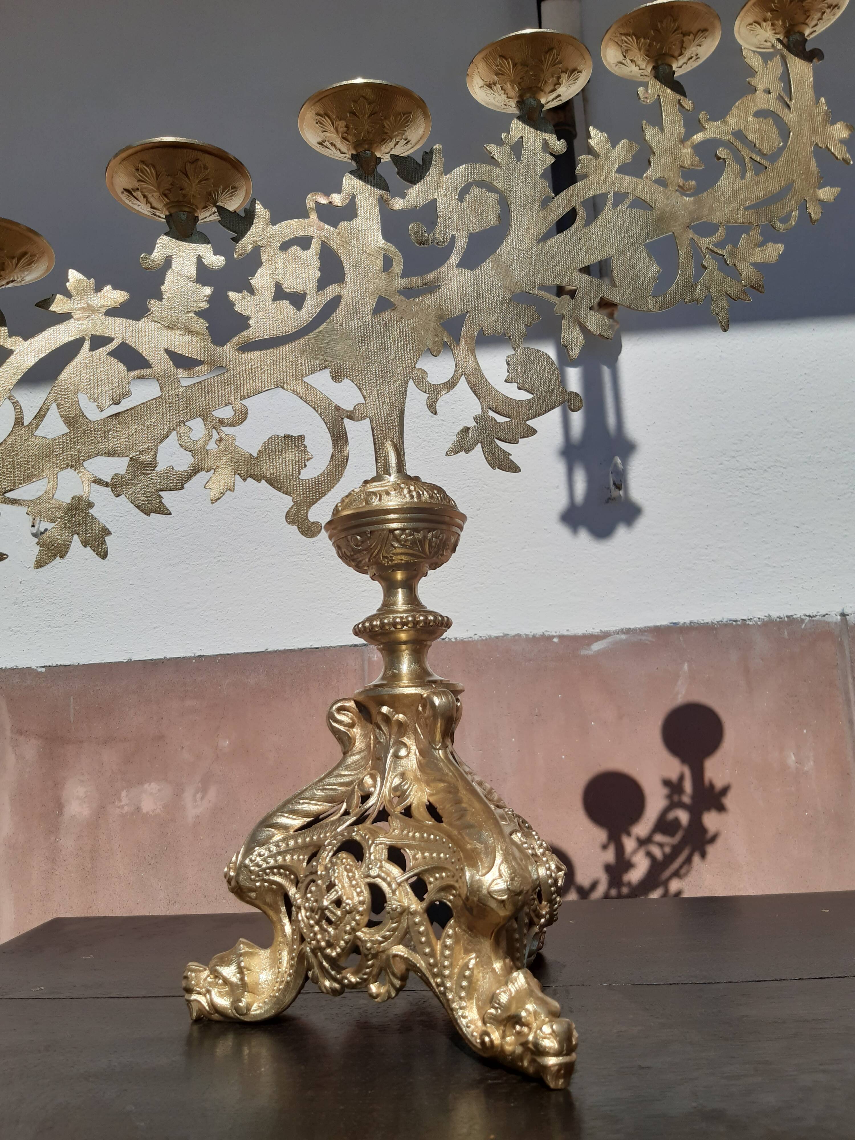 Antique candle holder in bronze and brass nineteenth century.