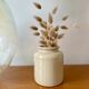 Beige enamelled sandstone pot