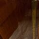 Wooden cabinet with doors, richly inlaid with floral patterns, Louis XV style.