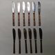 Set of 12 bamboo-style dessert knives in brass.