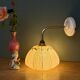 Vintage glass wall light with a pink and gold Clichy globe.