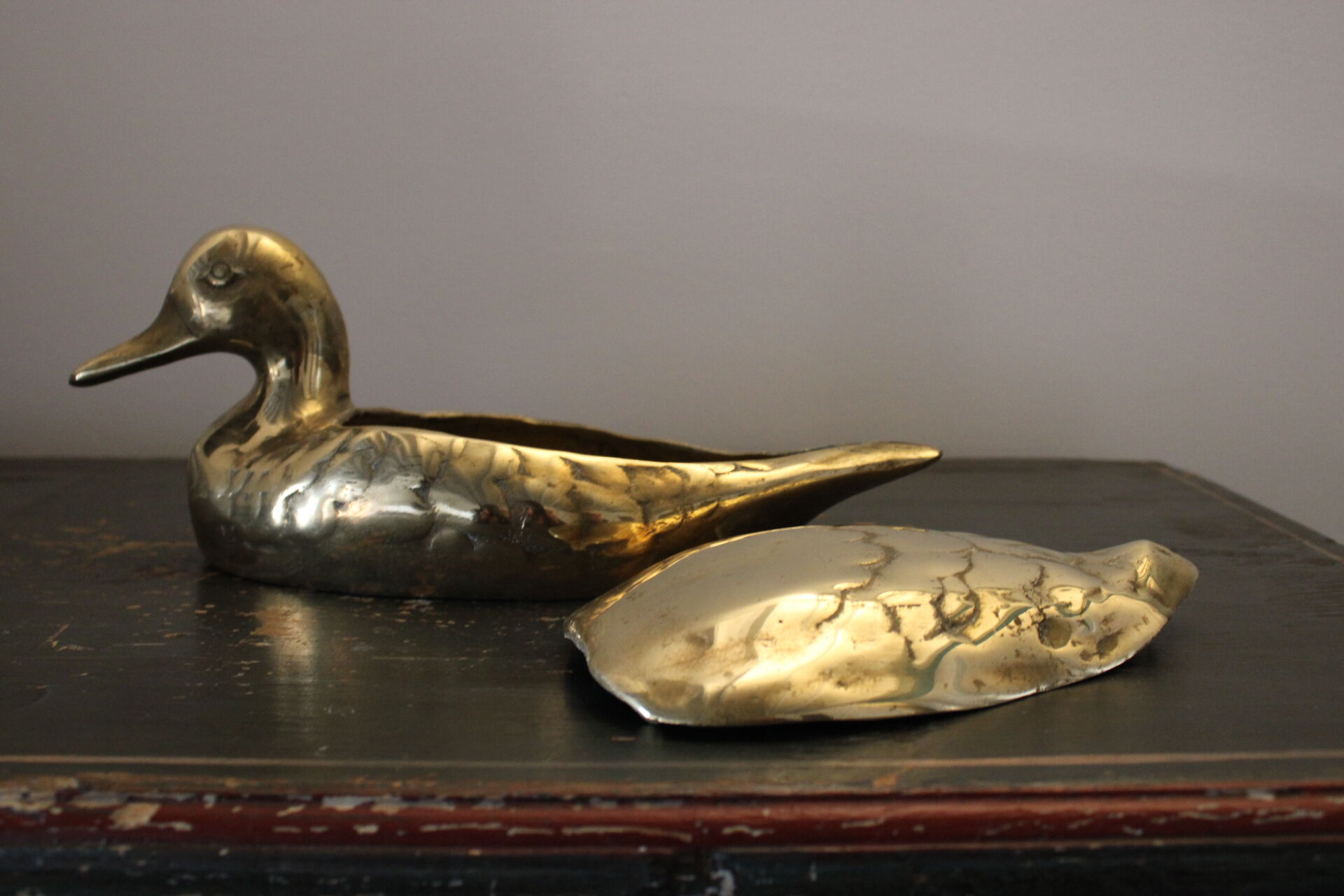Empty pocket vintage brass duck