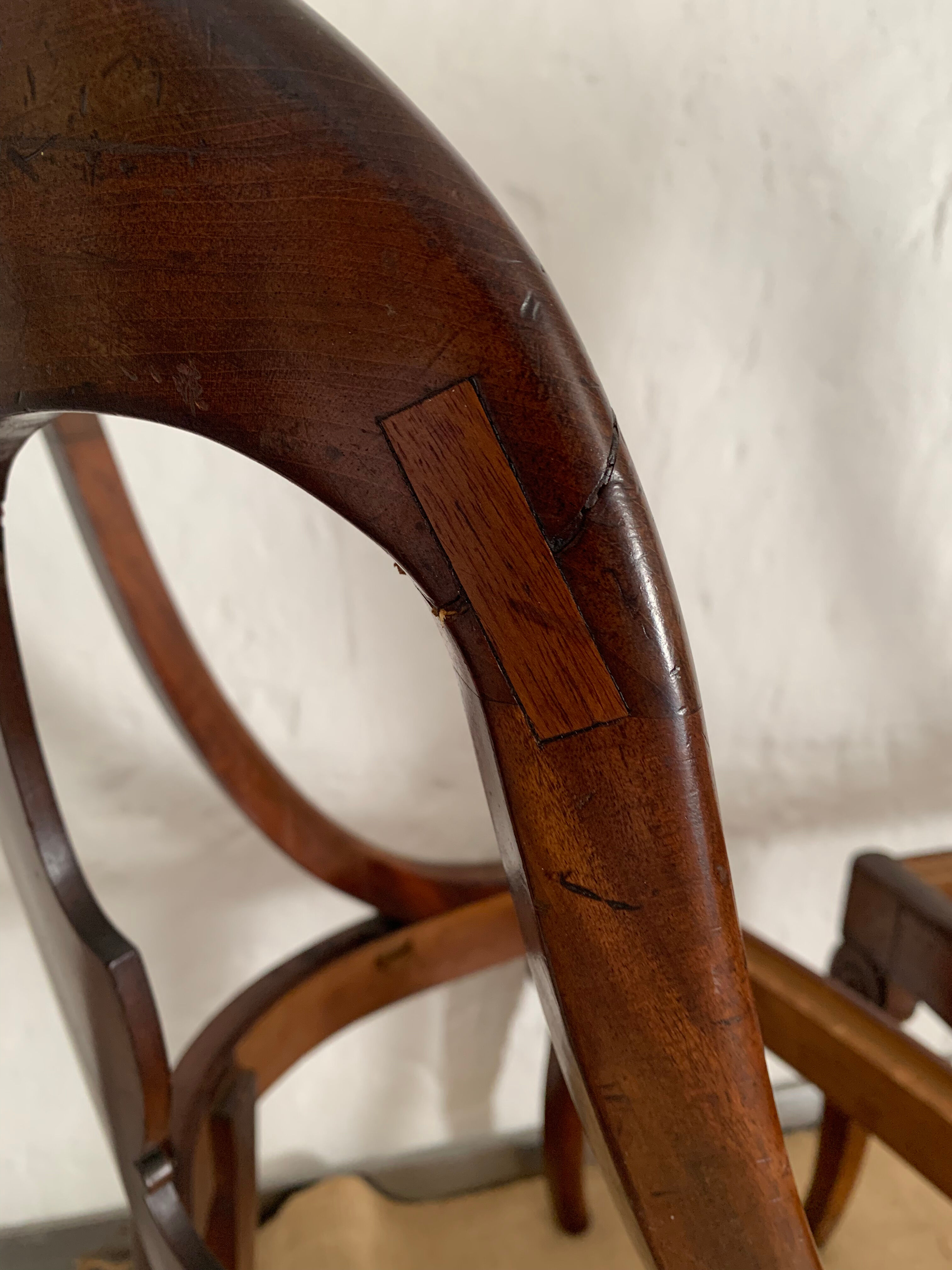 Two mahogany Empire Gondola chairs