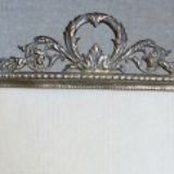 Small frame ornate brass of a node