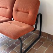Strafor 2-seater bench, orange wool and sled base, 1970s.