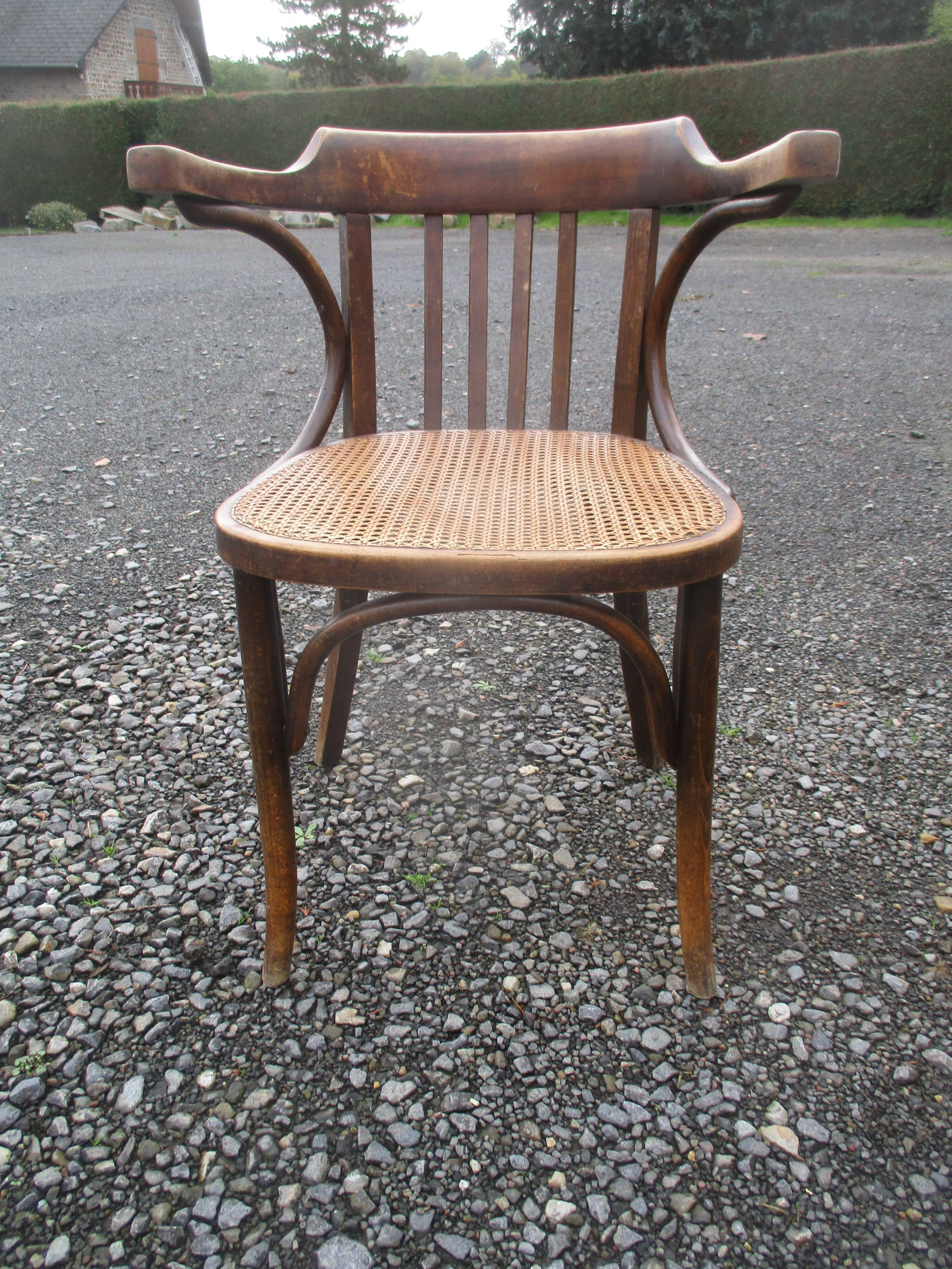 Canned bentwood armchair