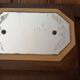 Vintage Art Deco wall coat rack in two-tone wood with engraved mirror.