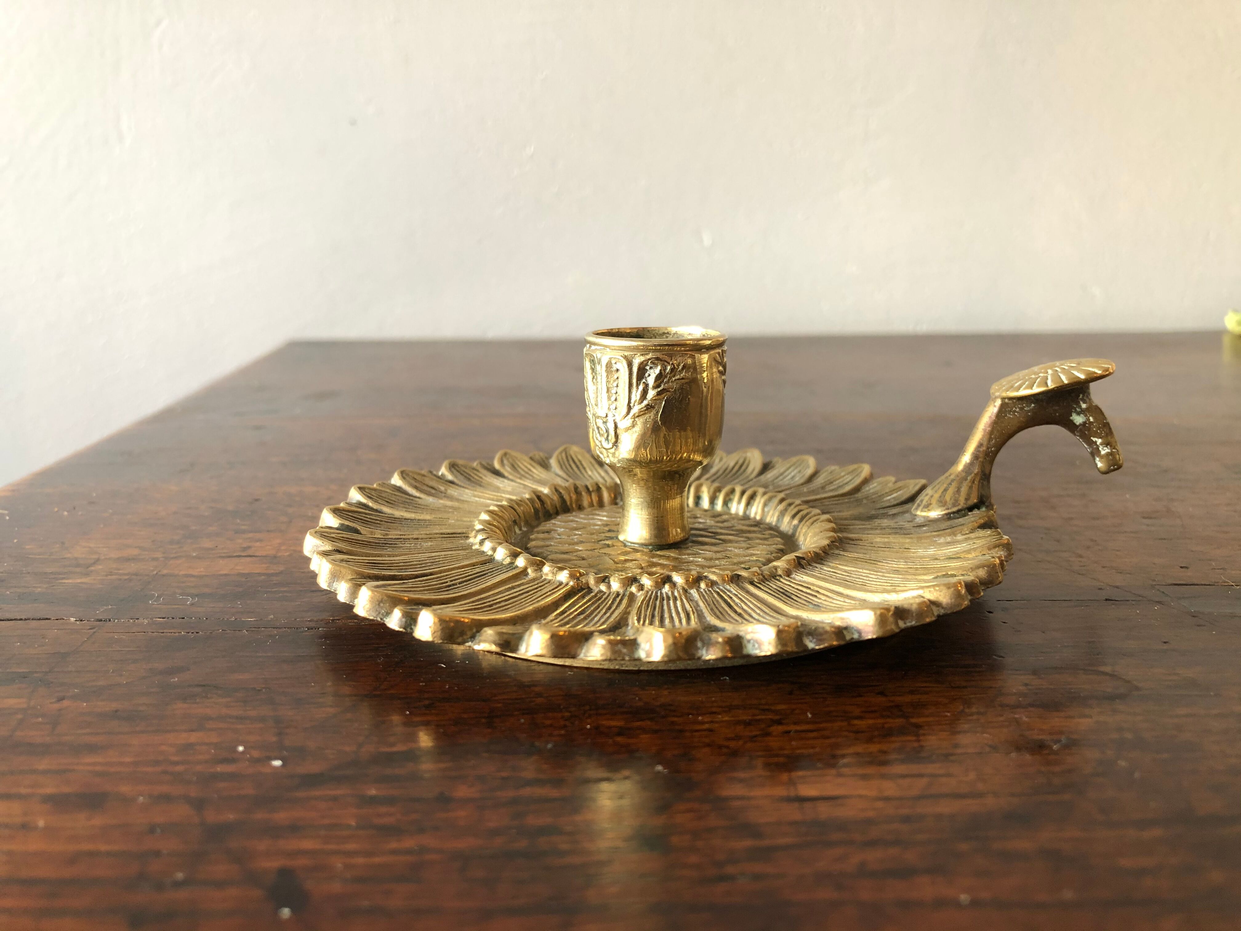 Brass hand-held candlestick