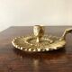 Brass hand-held candlestick