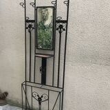 Wrought iron coat holder with 1930