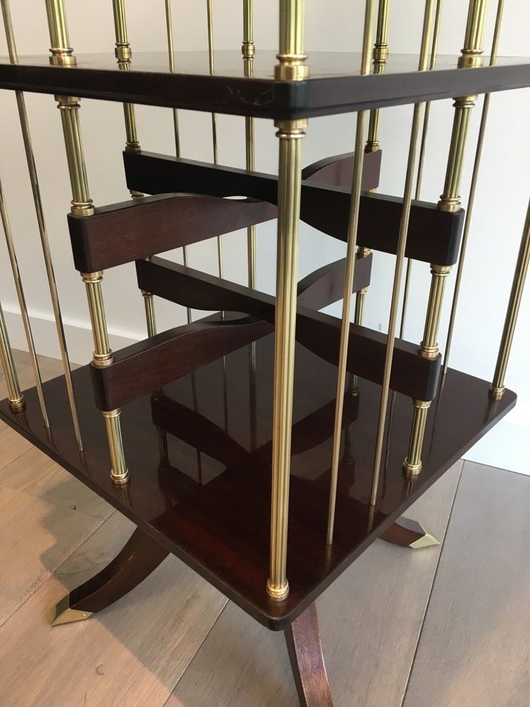 Rotating bookcase cabinet in mahogany and brass