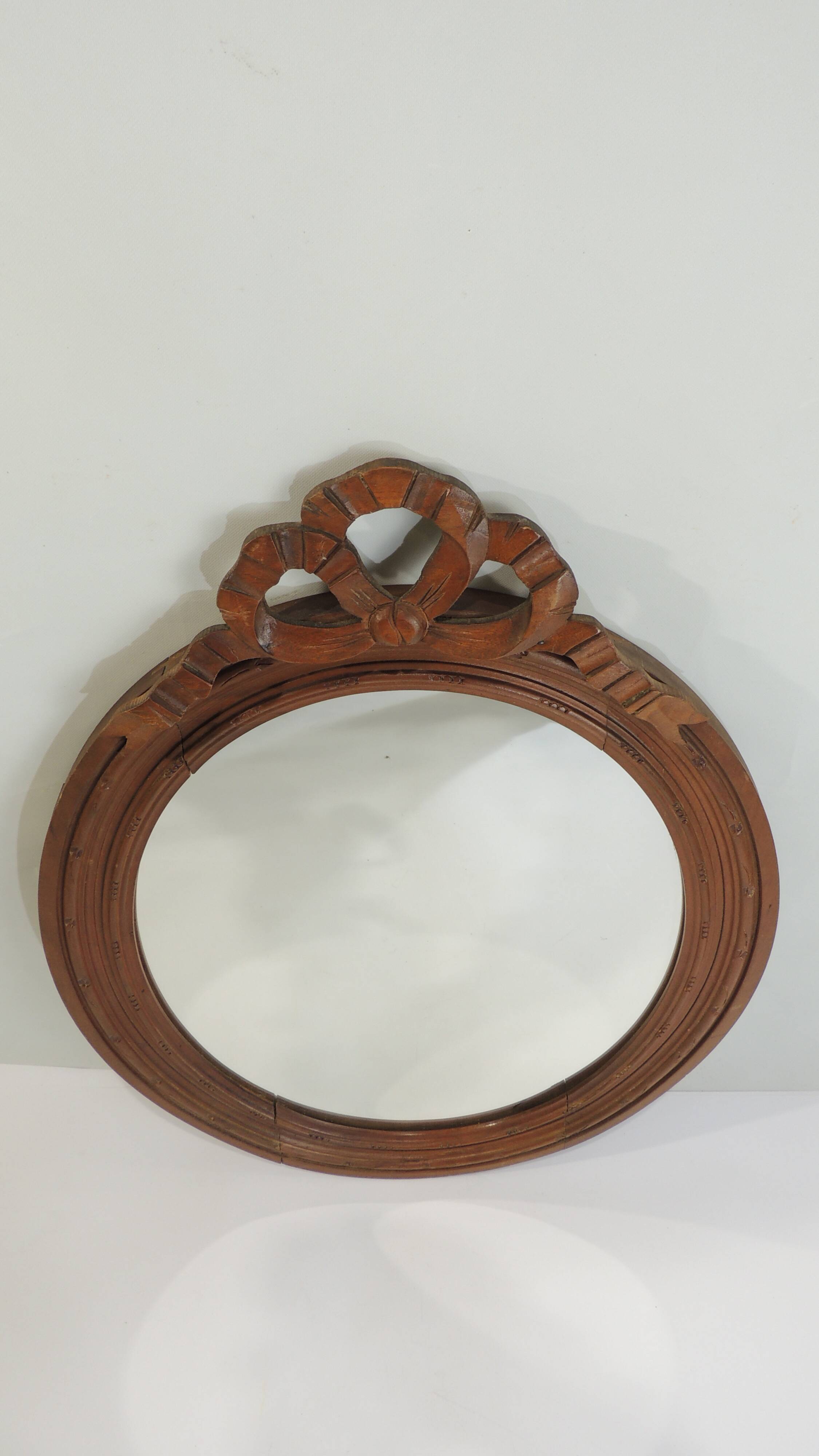 Antique oval mirror in carved wood – Louis XVI style, ribbon bow decoration, mid