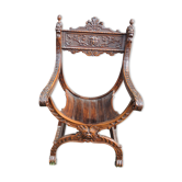 Former curulle chair says dagobert carved wood