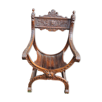 Ancien fauteuil curulle dit dagobert en bois sculpté