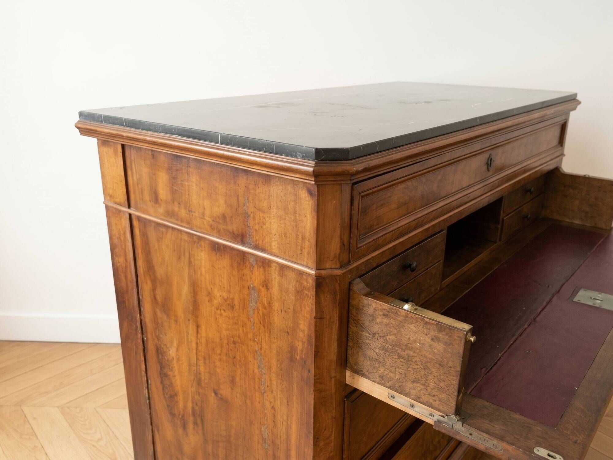 Antique walnut secretary chest with marble top.