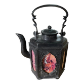 Ancient Asian teapot made of pewter and glass