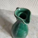 Small green ceramic pitcher