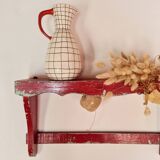 Wall shelf in garnet red wood