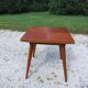 Extendable table with compass legs
