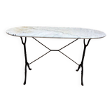 Authentic bistro table with white marble and cast iron from the early 20th century.