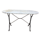 Authentic bistro table with white marble and cast iron from the early 20th century.