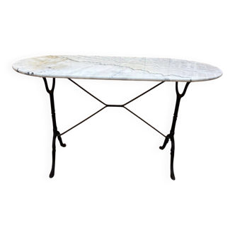 Authentic bistro table with white marble and cast iron from the early 20th century.