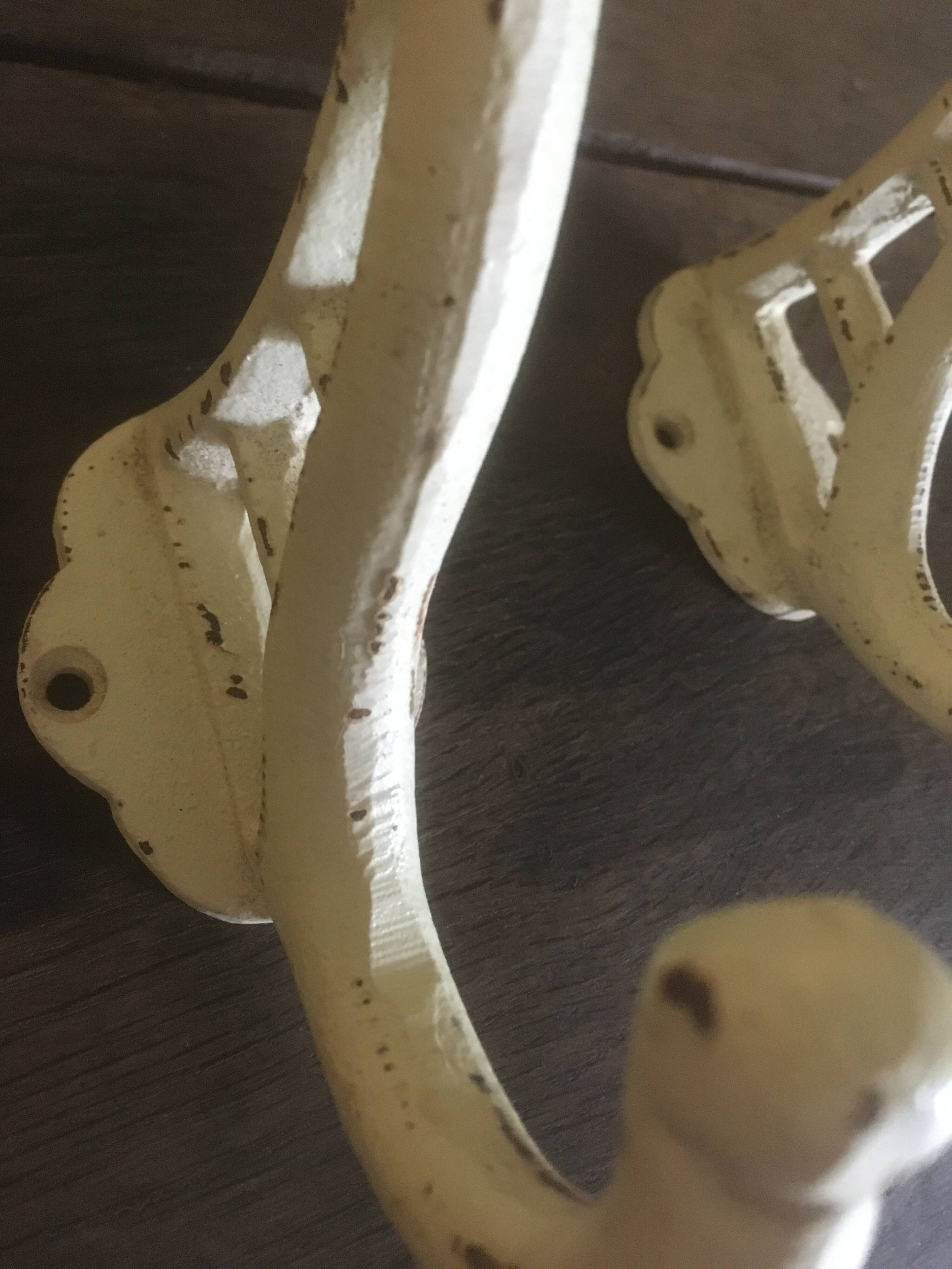 White cast iron wall hooks