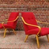 Pair of red armchairs model 6953 by Jaroslav Smidek published by TON