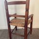 Vintage wooden armchair and straw seat for children