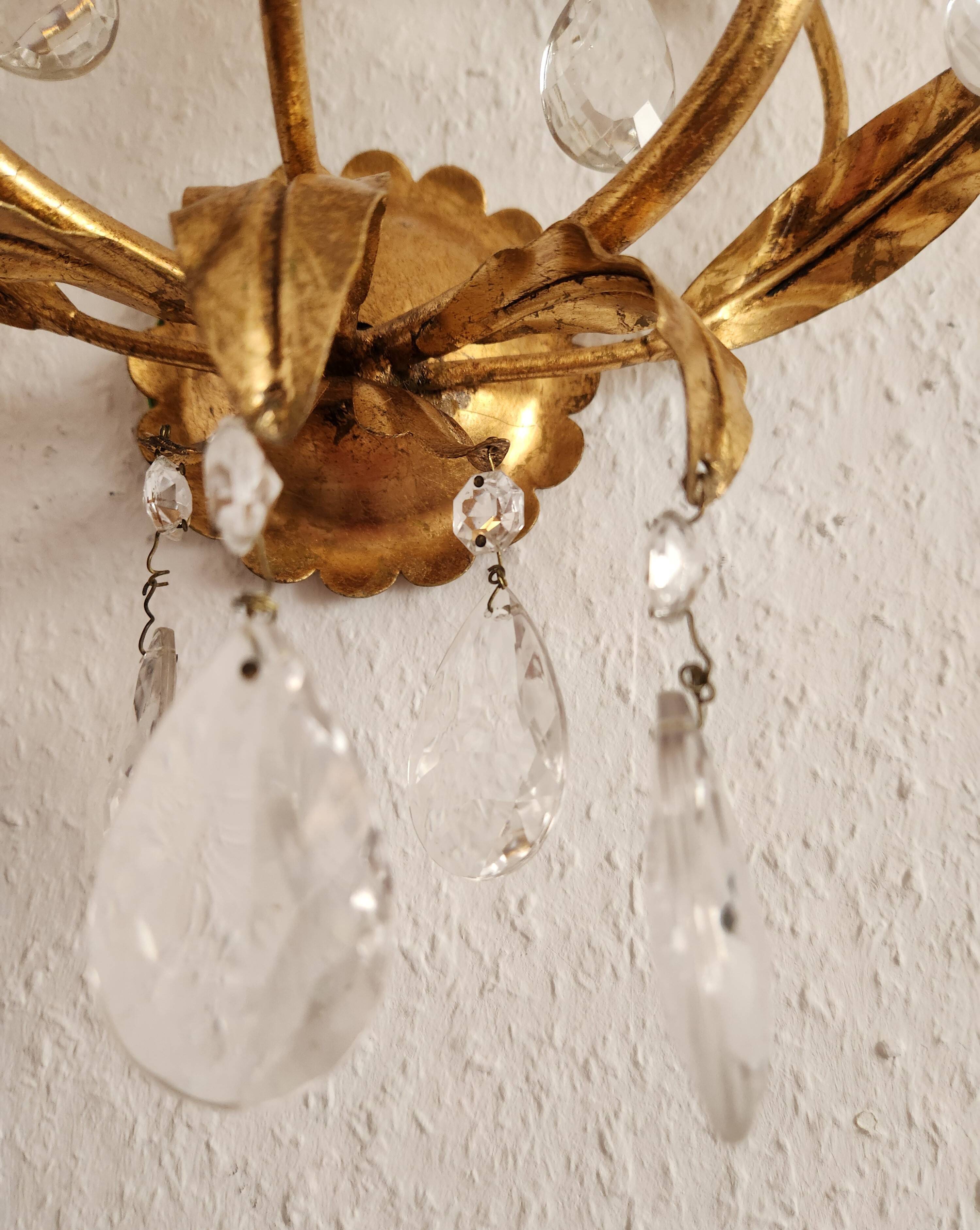 Hand-forged wall lamp gilded with gold leaf and crystals, Italy
