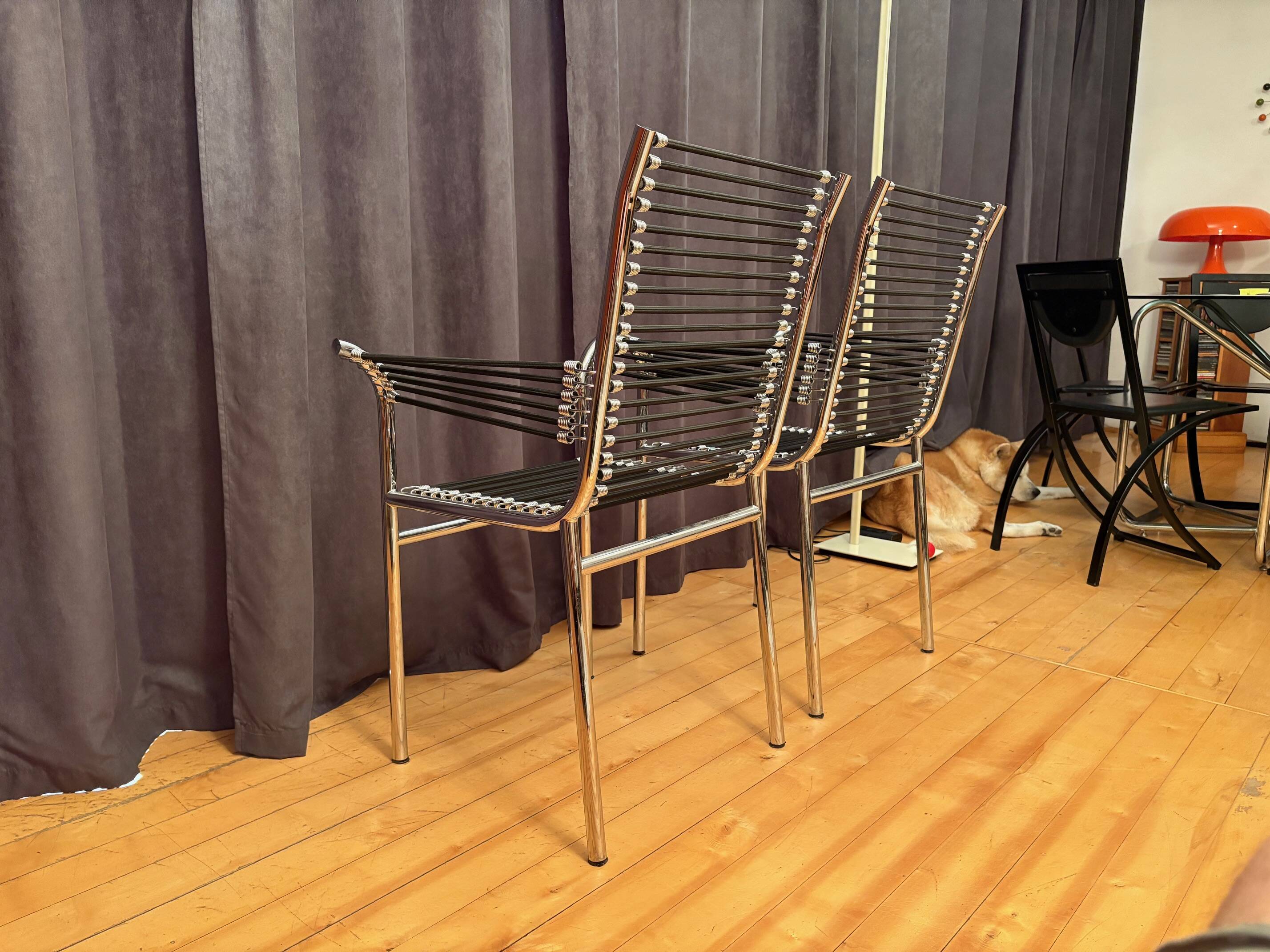 Pair of "Sandows" chairs designed by Rene Herbst, Bauhaus, France, 1980s