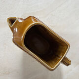 Ceramic pitcher braided pattern