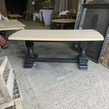Raw wood table with black base