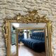 Antique mirror with a frame 123/100cm with gilded pediments, eagle heads, antique.