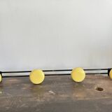 Wall coat rack with 4 vintage yellow metal hooks