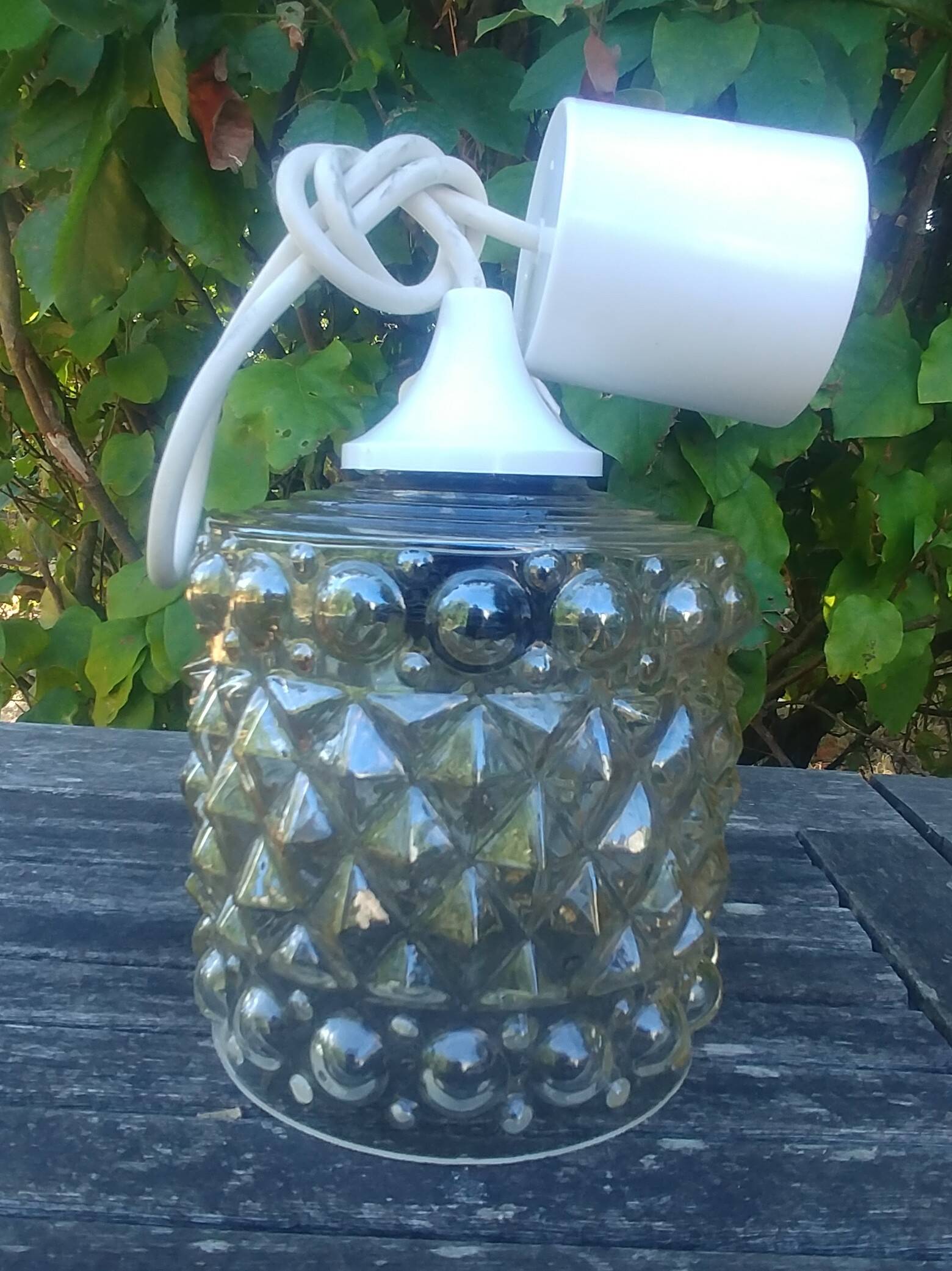 A 70s-vintage amber molded glass "bubble" pendant/lamp