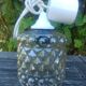 A 70s-vintage amber molded glass "bubble" pendant/lamp