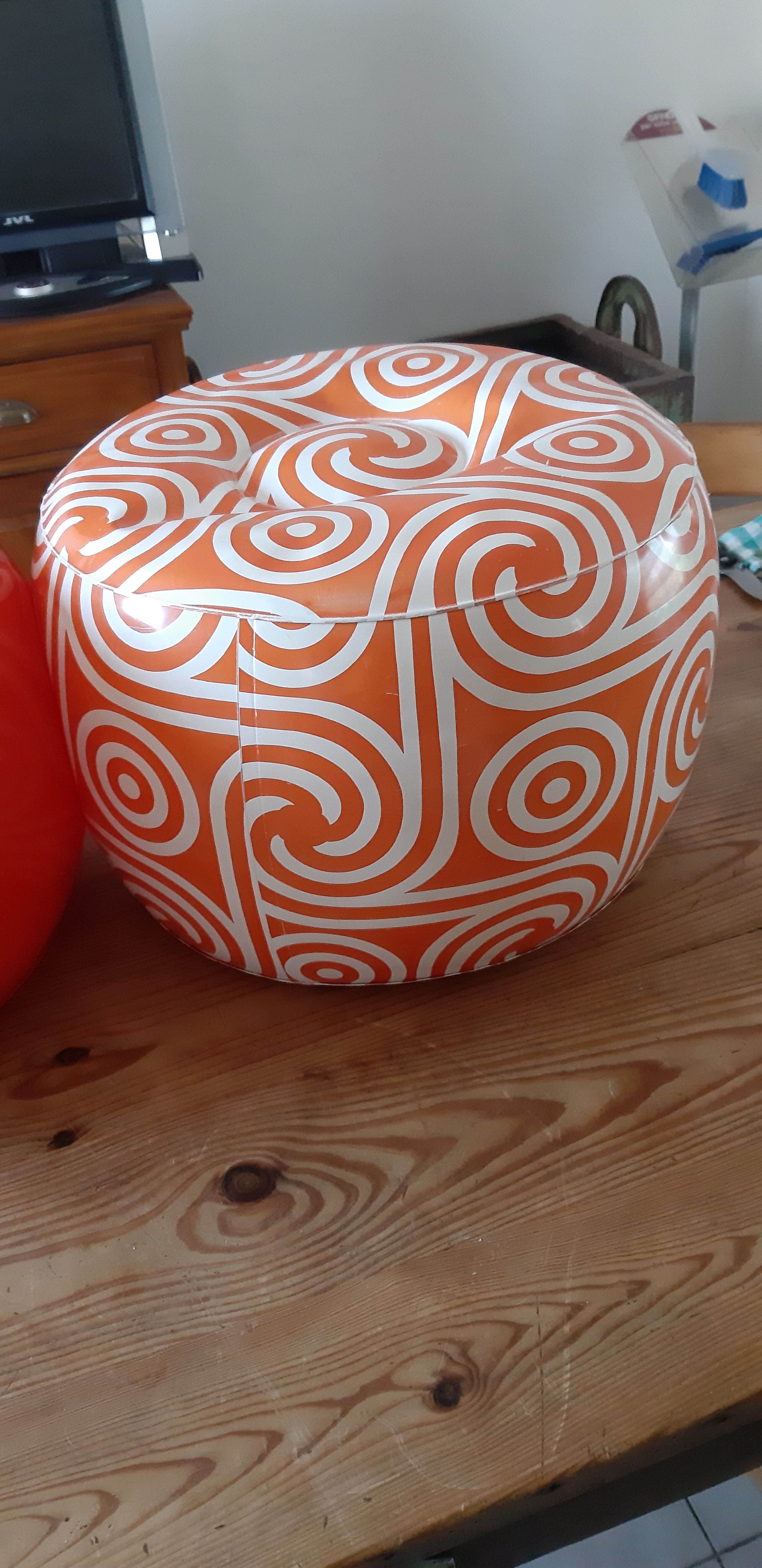 2 vintage inflatable poufs in orange plastic