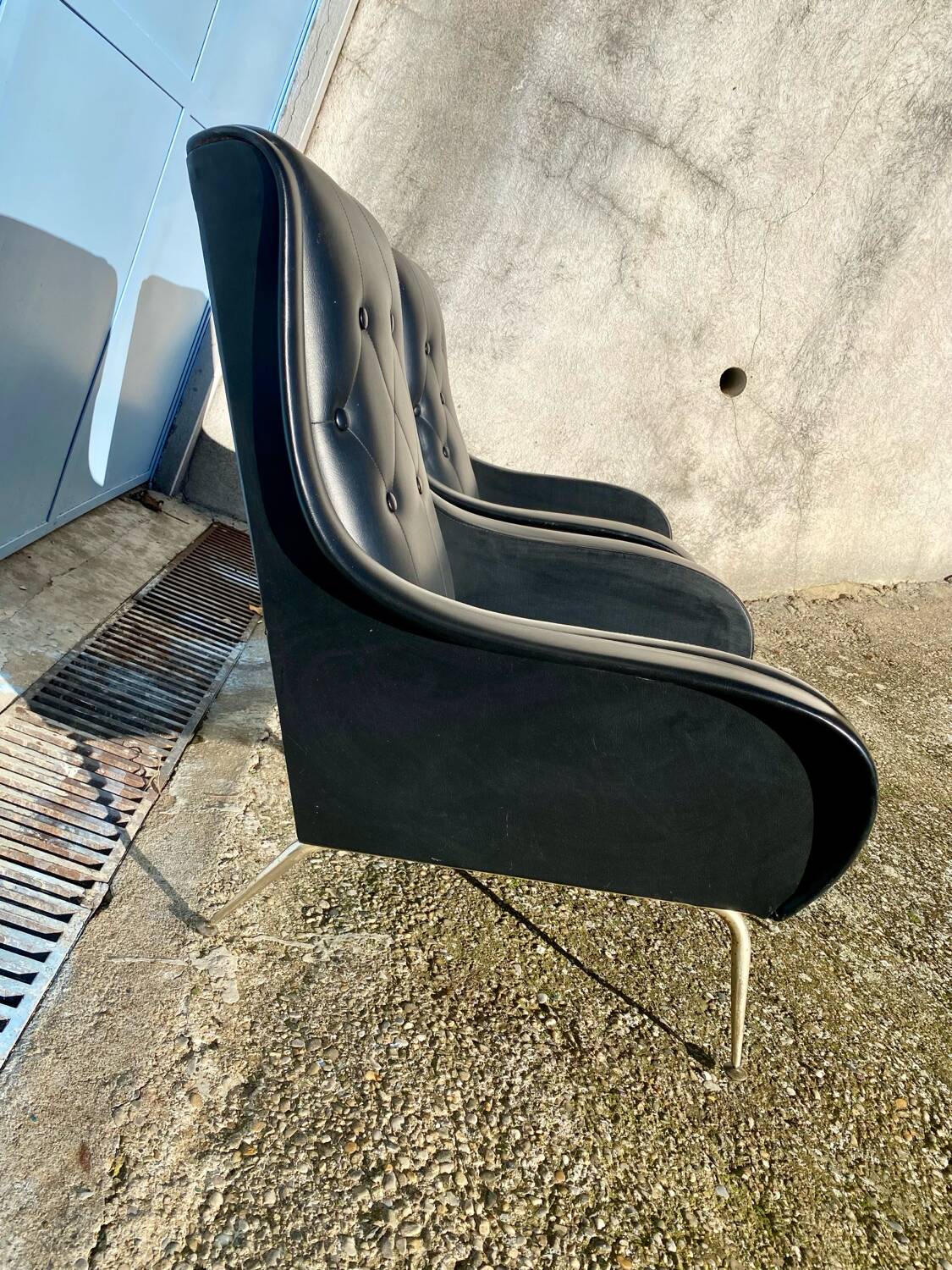 2 vintage faux leather armchairs
