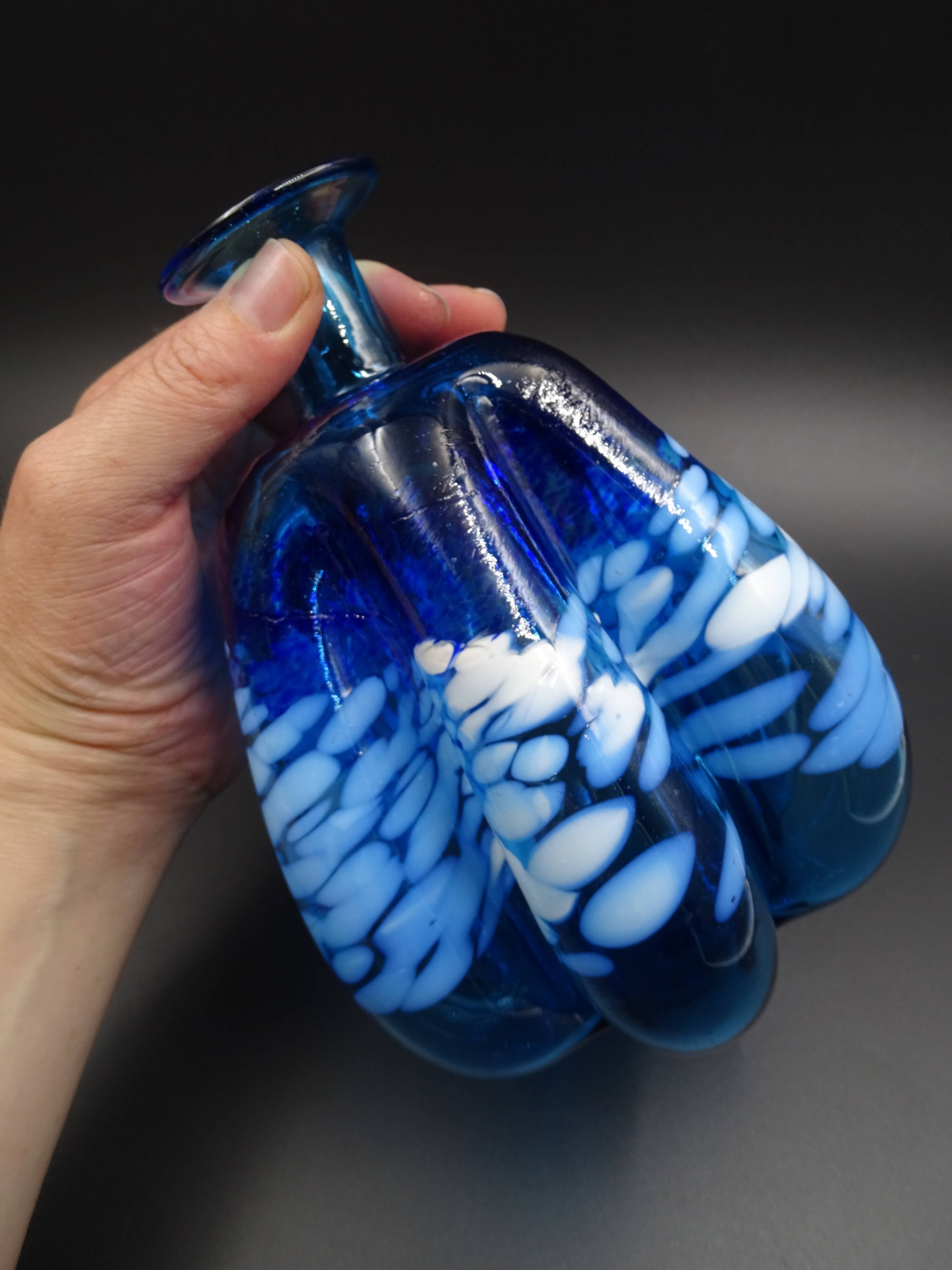 Blue glass vase and touches of white