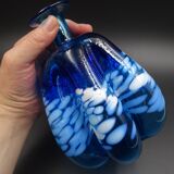 Blue glass vase and touches of white