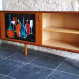 Sidbeoard with sliding doors and ceramic decoration