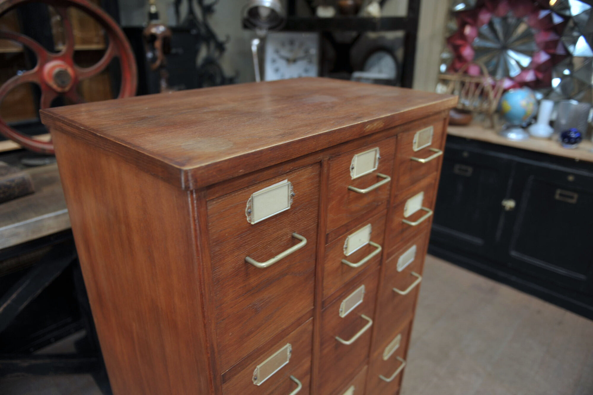 Office furniture has oak drawers 1950 brass handles and label holders